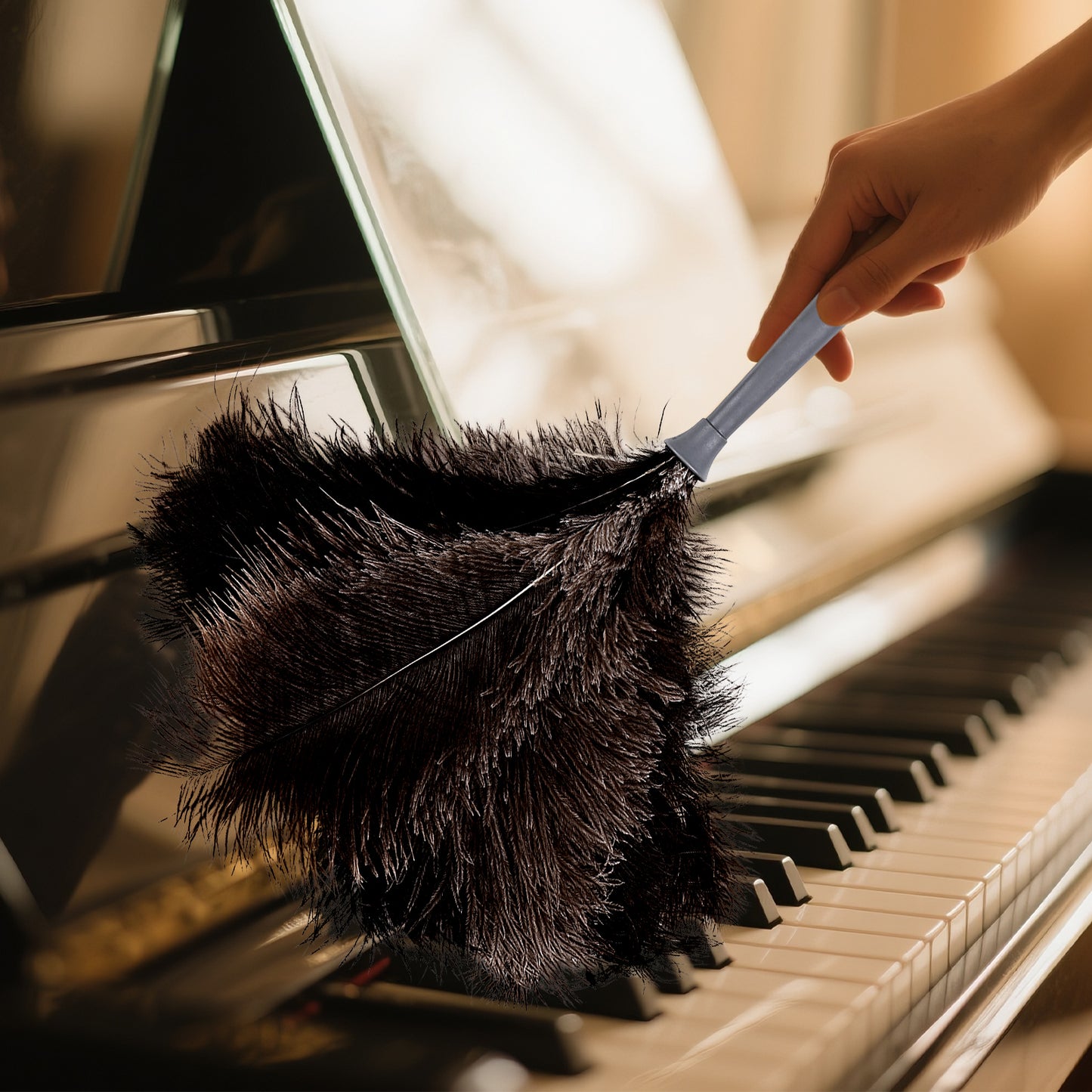 Car ostrich feather duster with gray plastic handle, capable of absorbing dust without raising dust